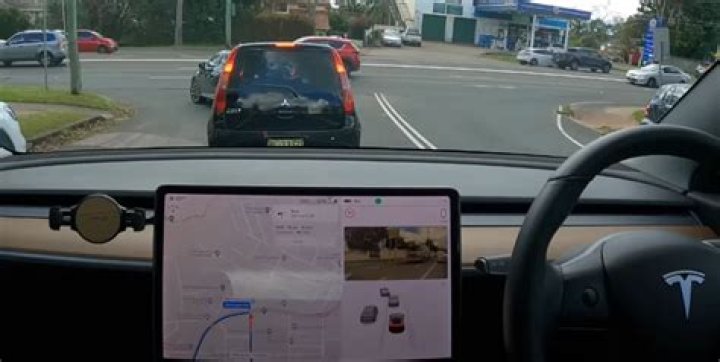 Does Tesla have blind spot warning?