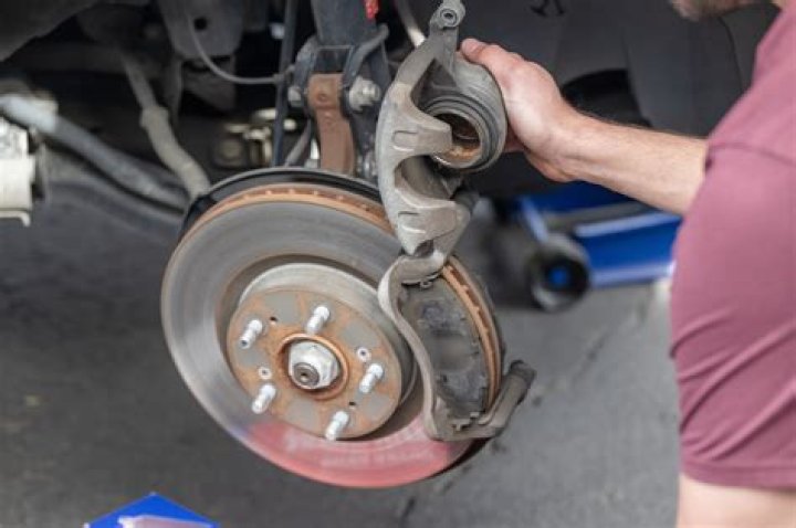 How do you degrease a brake caliper?