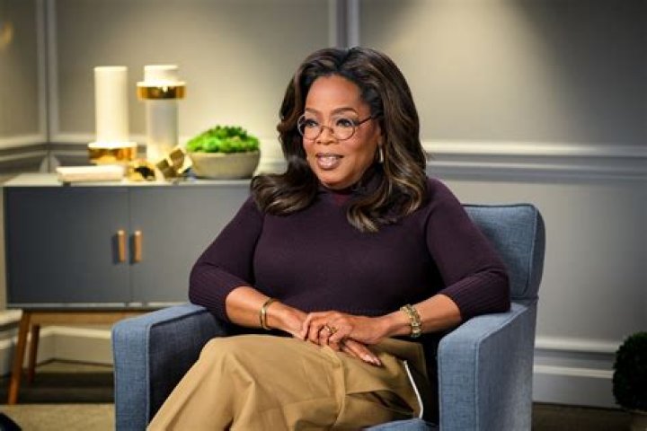 How old was Oprah when she became a billionaire?