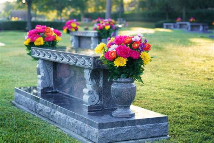 Is it OK to plant flowers on a grave?