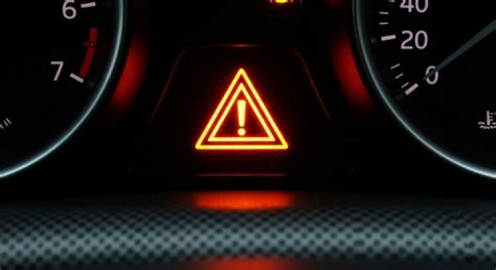What does the steering wheel light with an exclamation mark mean?