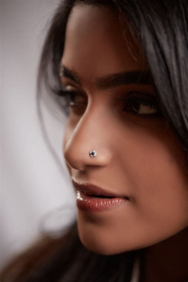 Why do Indian ladies pierce their nose?